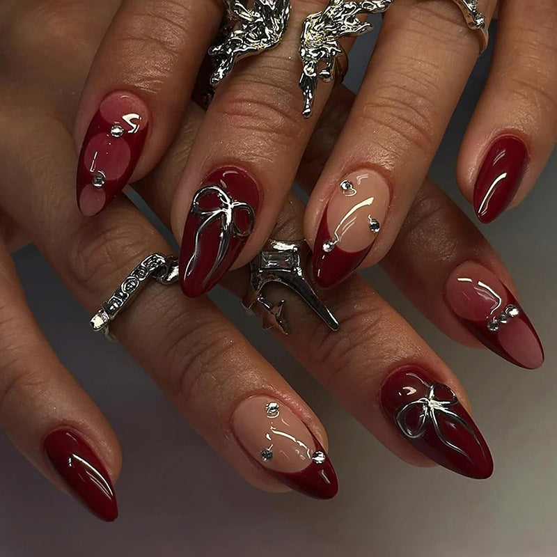 Artificial nail set with luxurious glitter and gemstone embellishments Kalsten