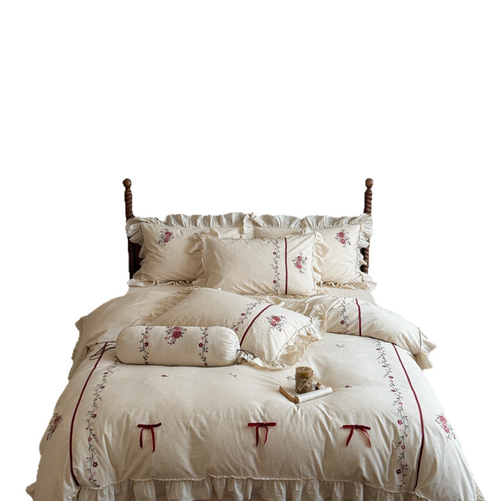 Romantic cotton-linen bedding set with ruffle, rose embroidery and bolster pillow