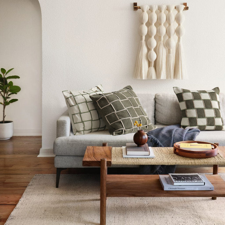 woven decorative pillow with braided square pattern