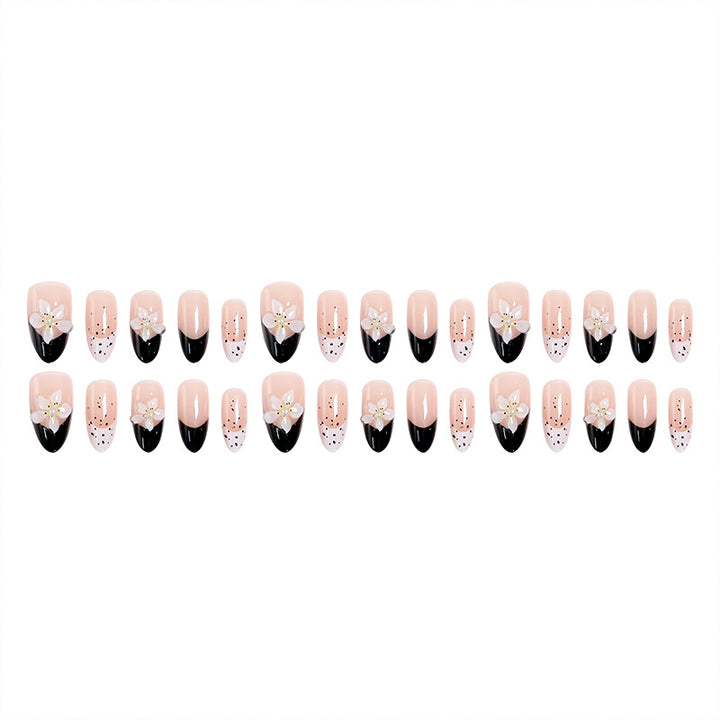 Artful nail tips with floral embellishments Kalsten