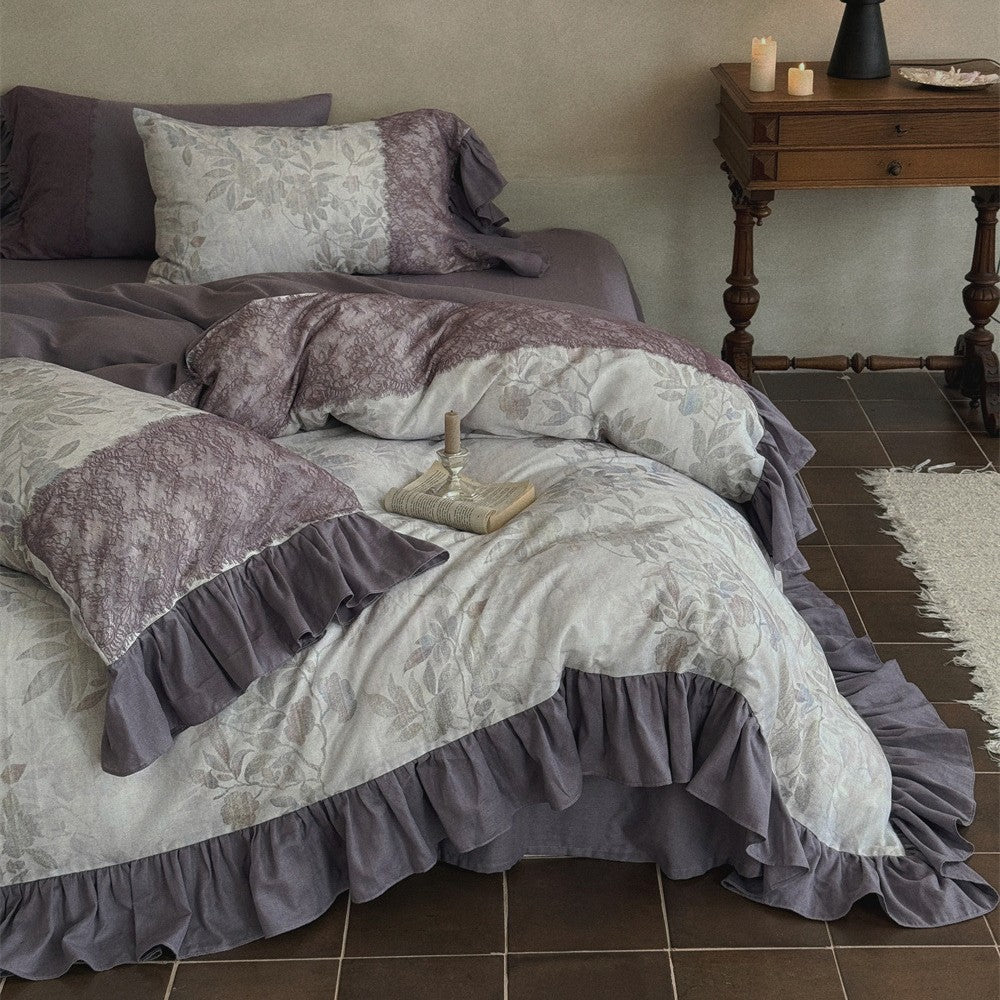 Bedding set with jacquard panels, ruffled bed skirt and reversible pillow