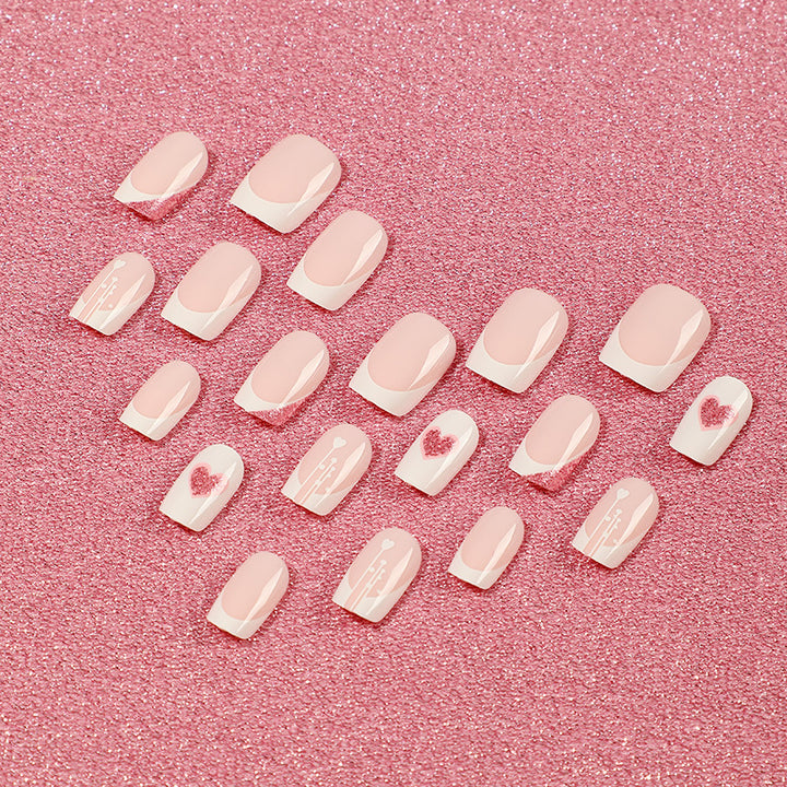 Artful nail designs with heart and glitter accents Kalsten