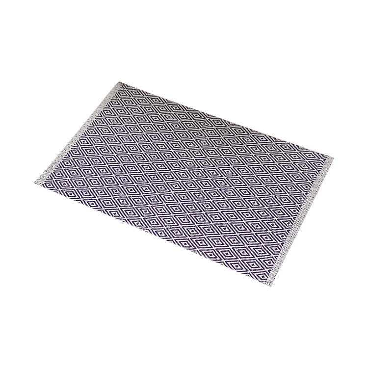 Woven colorful table runner with fringes and checkered structure