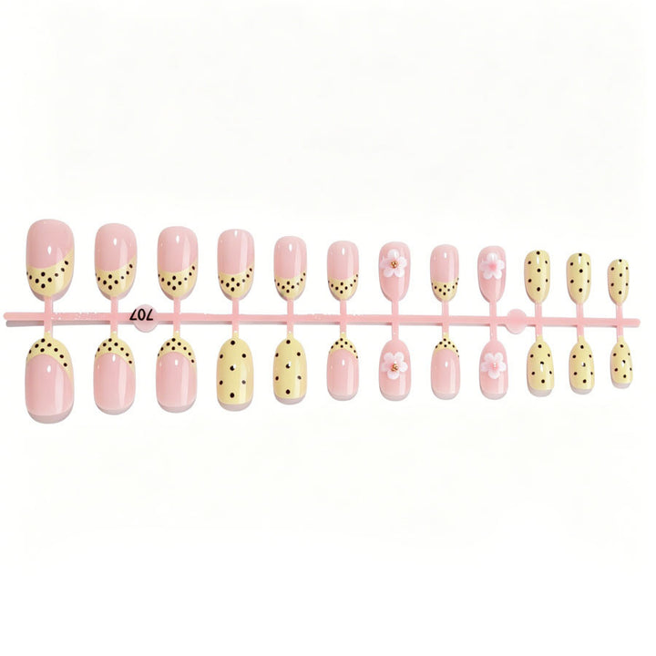 Artificial nail set with a cheerful floral design and elegant accents Kalsten