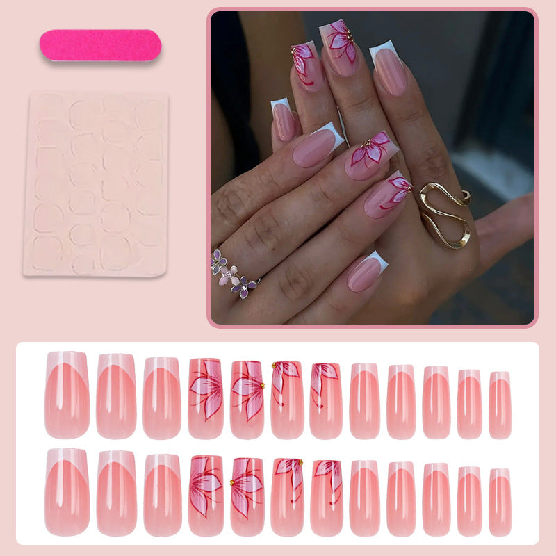 Artificial nail set with elegant flower designs and glitter accents Kalsten