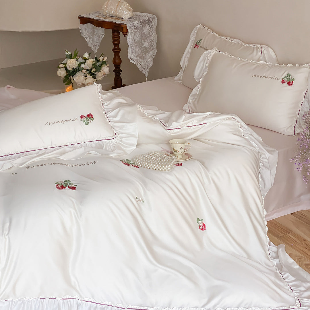 Romantic satin bedding set with strawberry embroidery and ruffles
