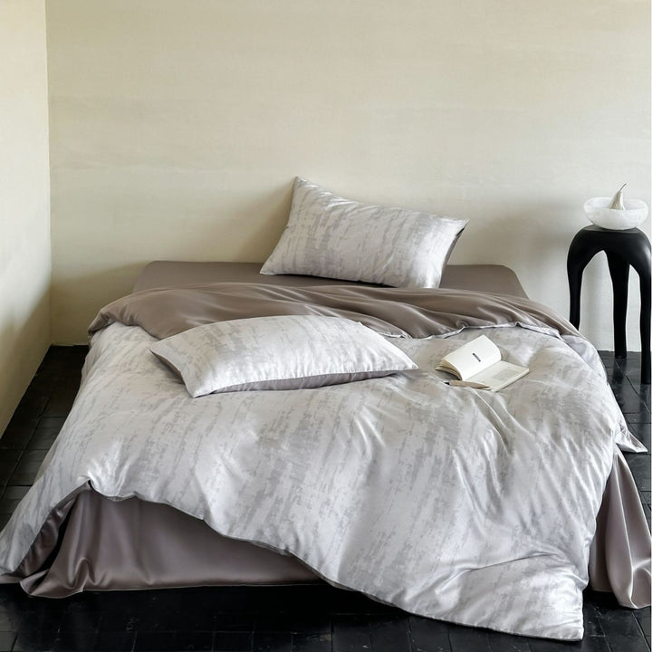 Satin bedding set with floral print and ruffle