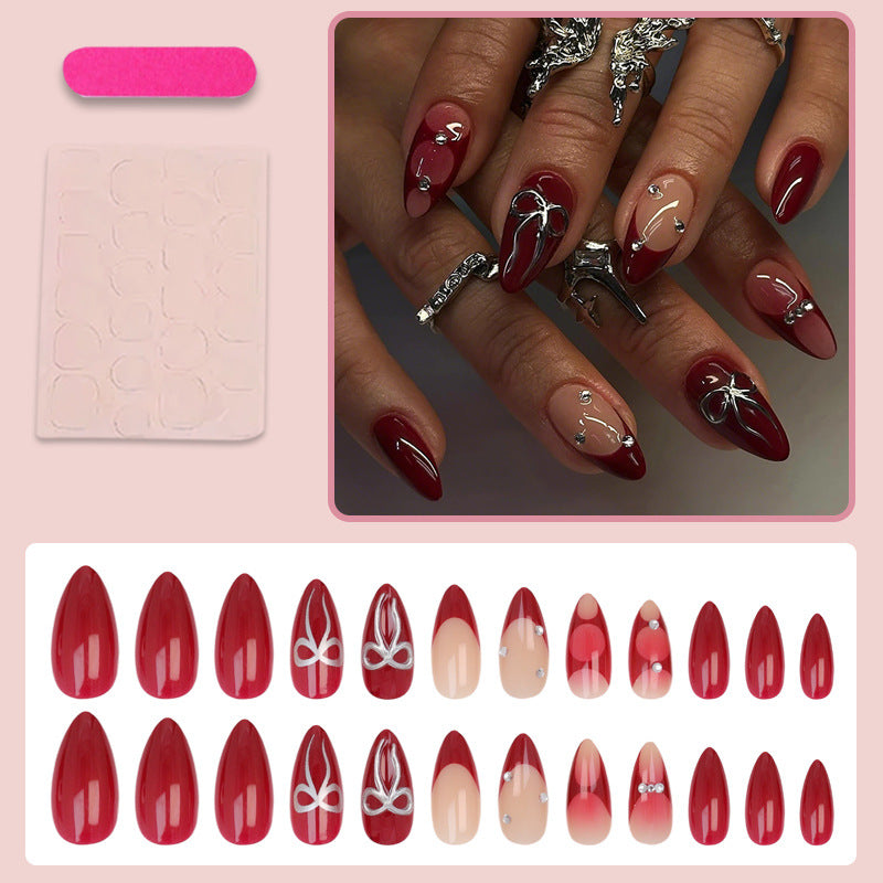 Artificial nail set with luxurious glitter and gemstone embellishments Kalsten
