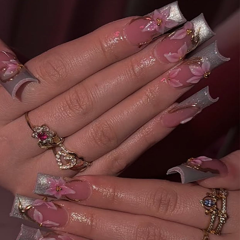 Elegant artificial nail set with floral designs and glitter accents Kalsten