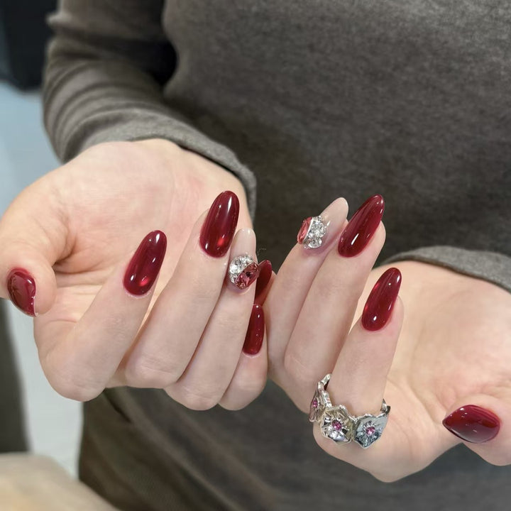 Elegant Press-On Nail Extensions with Decorative Gem Accents