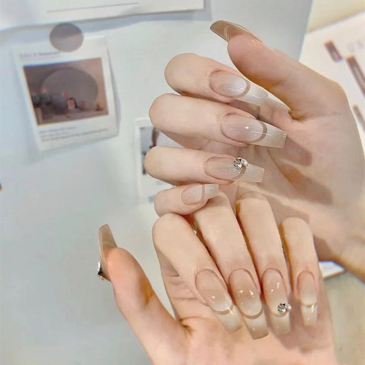 Glamorous artificial nails with elegant rhinestone decorations Kalsten