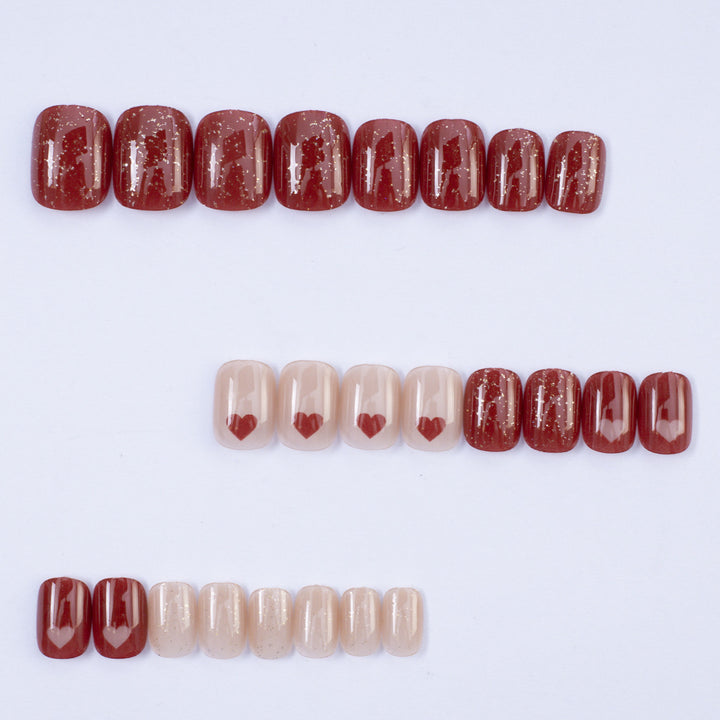 Art nail set with heart designs and glitter Kalsten