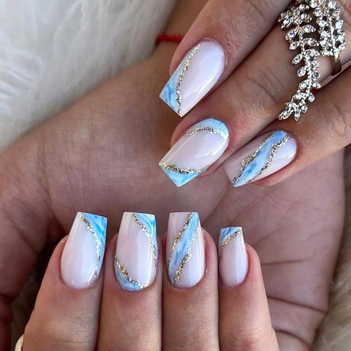 Artful nail design with maritime accents Kalsten
