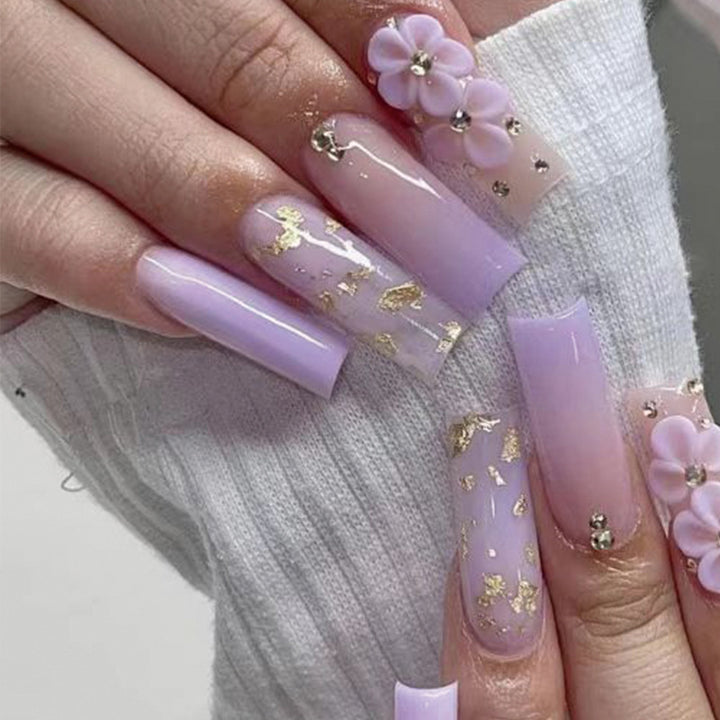 Artistic Gel Nails with Floral Design and Glitter Accents Kalsten