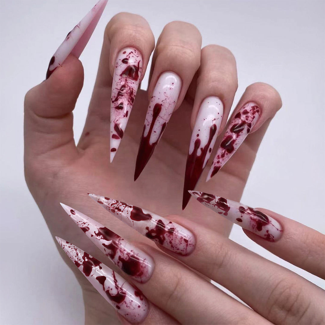 Creative Stiletto Nail Art with Blood Red Accents Kalsten