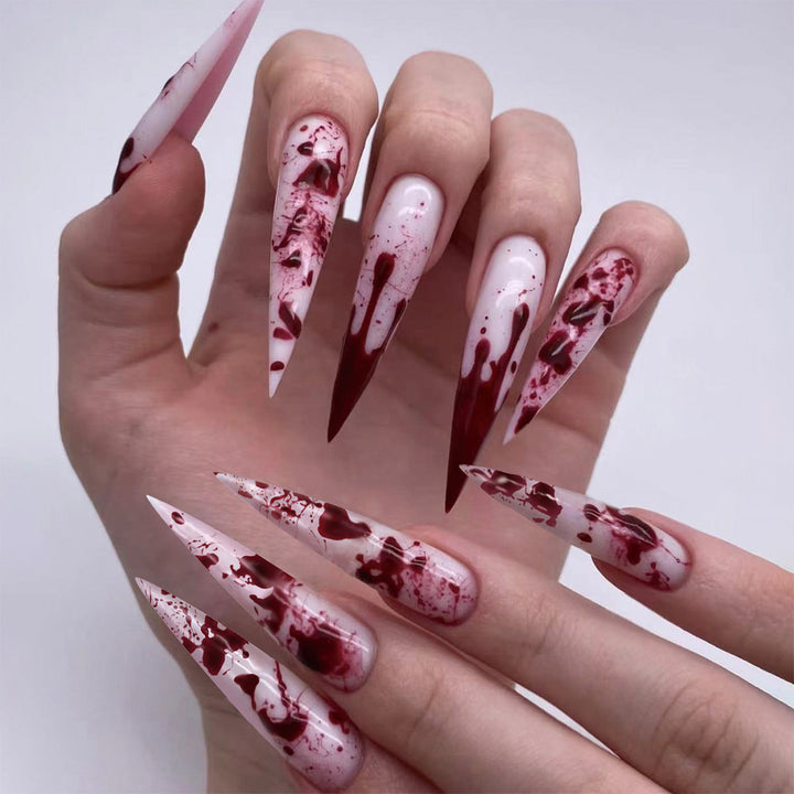Creative Stiletto Nail Art with Blood Red Accents Kalsten