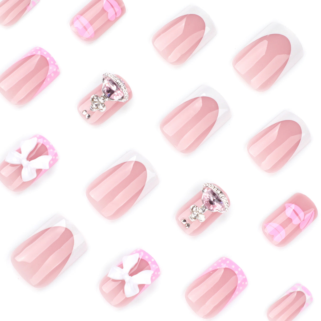 Artful Nail Art with Glitter and Flower Design Kalsten