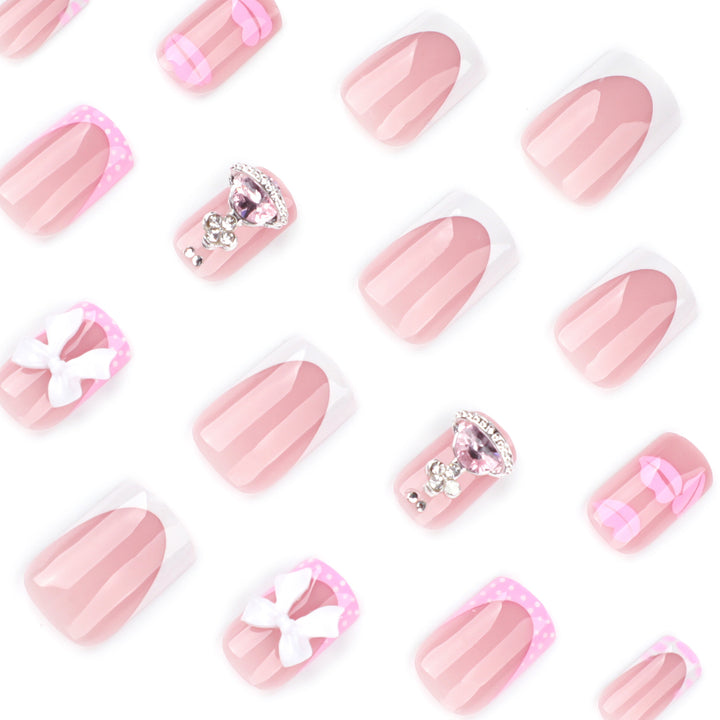 Artful Nail Art with Glitter and Flower Design Kalsten