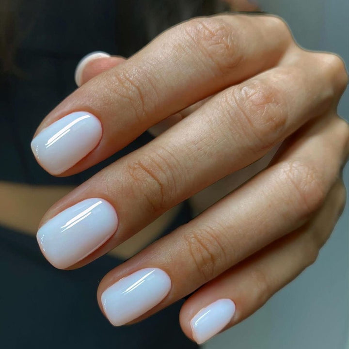 Acrylic nail set with luxurious color gradient and elegant lace accent Kalsten