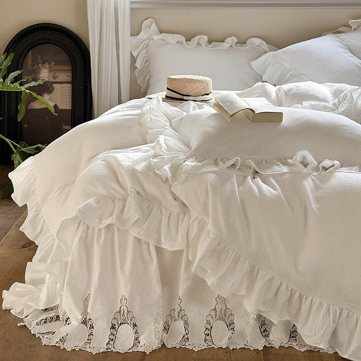 Romantic bedding set with voluminous ruffle, lace bed skirt, and double-layered frills