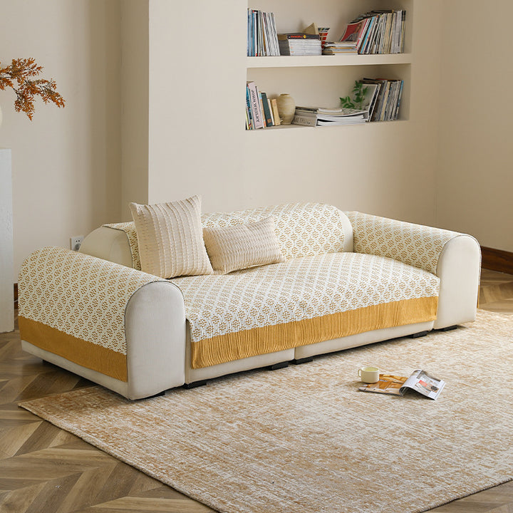 Sofa cover and sofa runner made of knitted cotton blend with non-slip edge