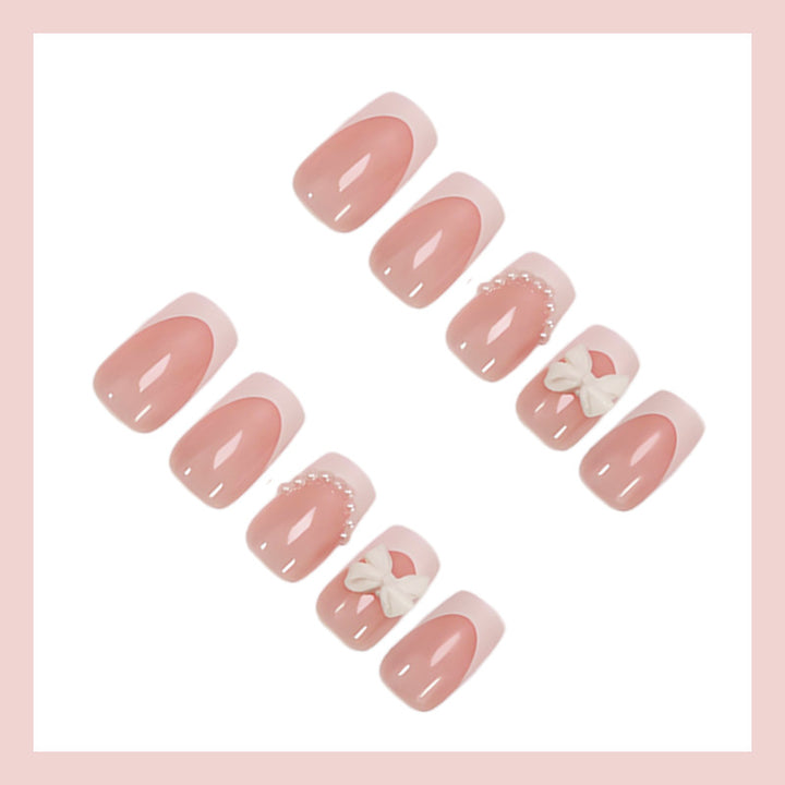 Artifice nail set with elegant flower and pearl decorations Kalsten