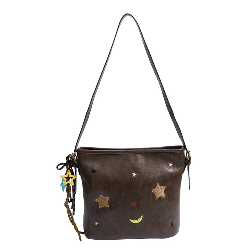 Shoulder bag with charming applications Kalsten