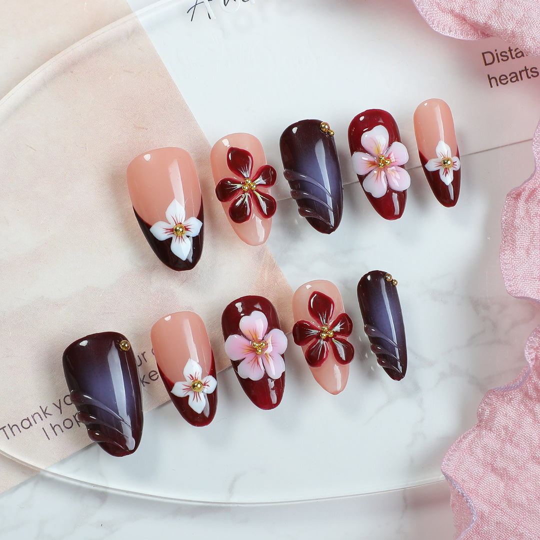 Acrylic nail set with floral accents and luxurious decorations Kalsten