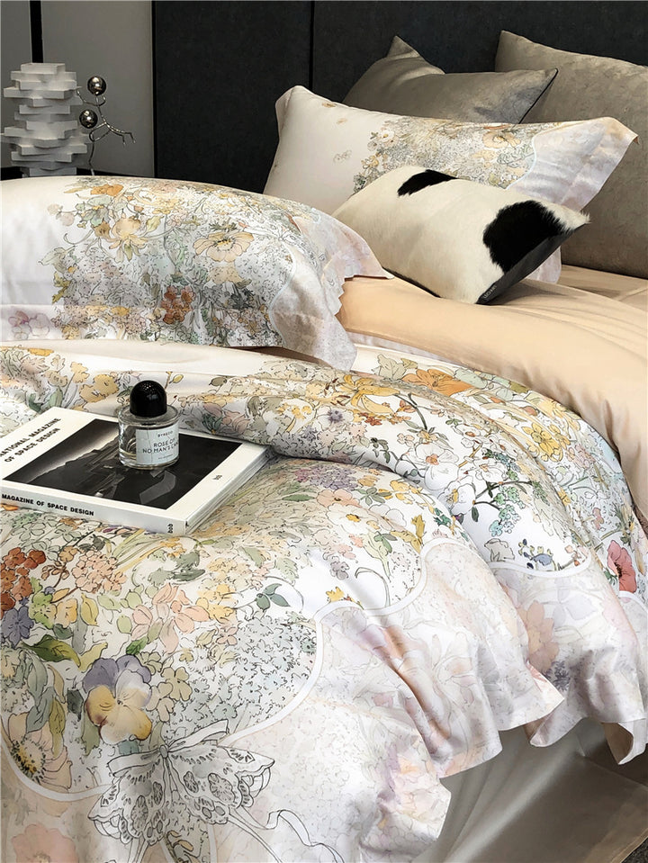Duvet cover set made of cotton satin with subtle watercolor flower print and silky-matte texture