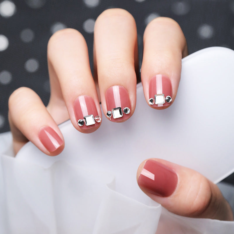 Decorative Nail Art with Gemstone Accents