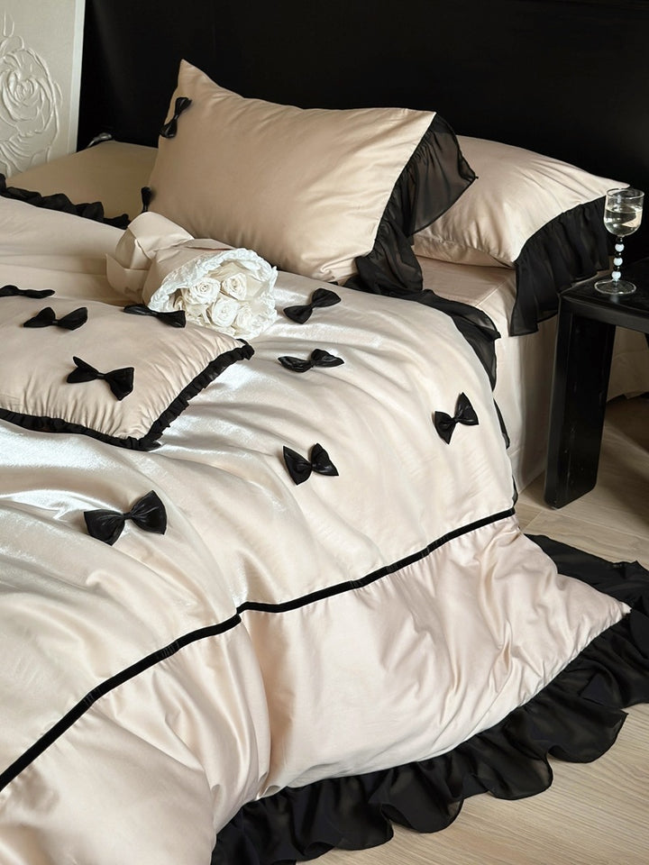 Elegant bedding set made of cotton satin with attached bows and ruffles