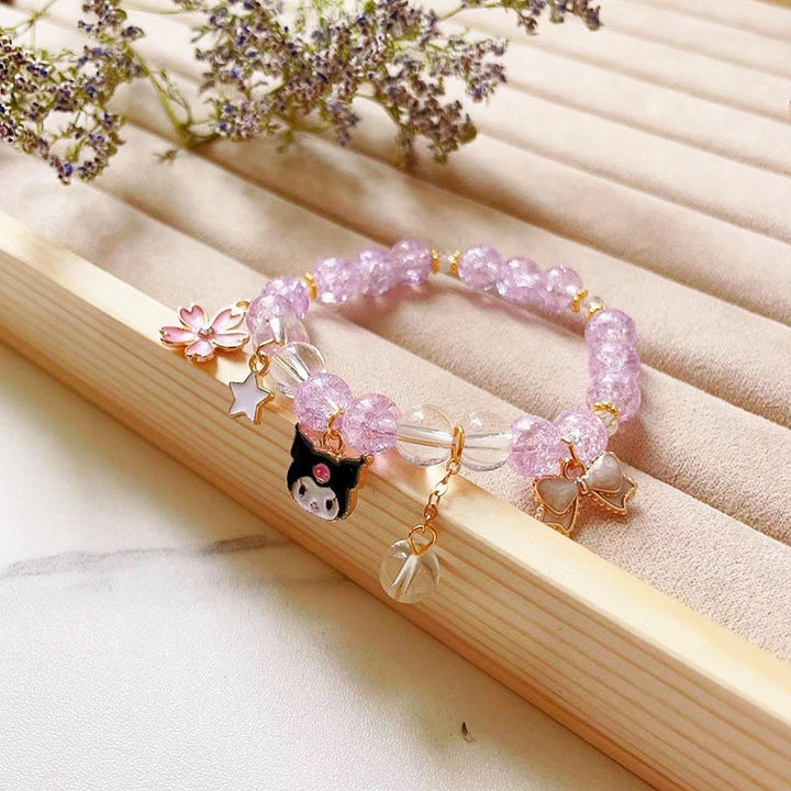 Elegant bracelet with animal and glitter pendants Kalsten