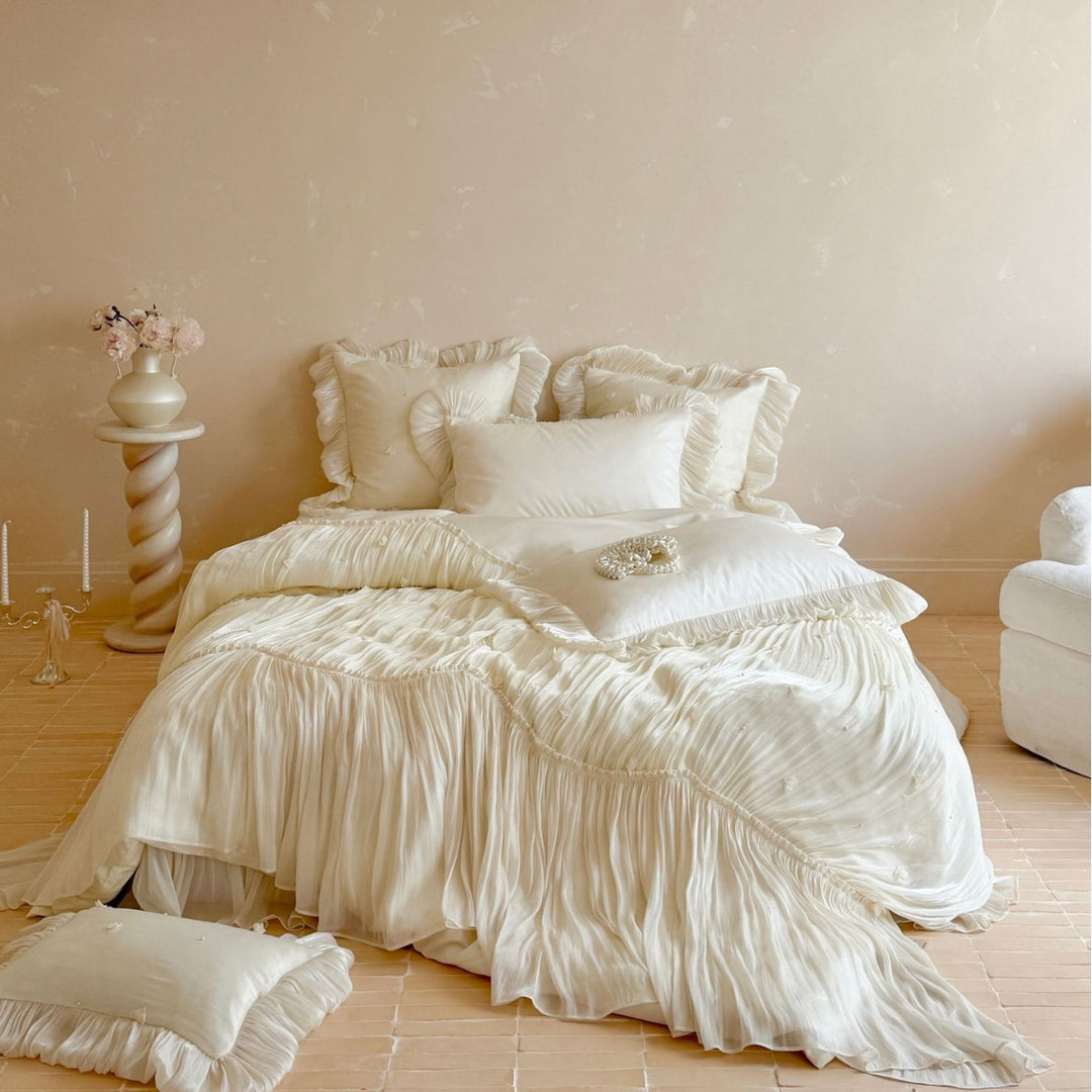 Luxurious romantic bedding set with pleated ruffles and decorative cushion