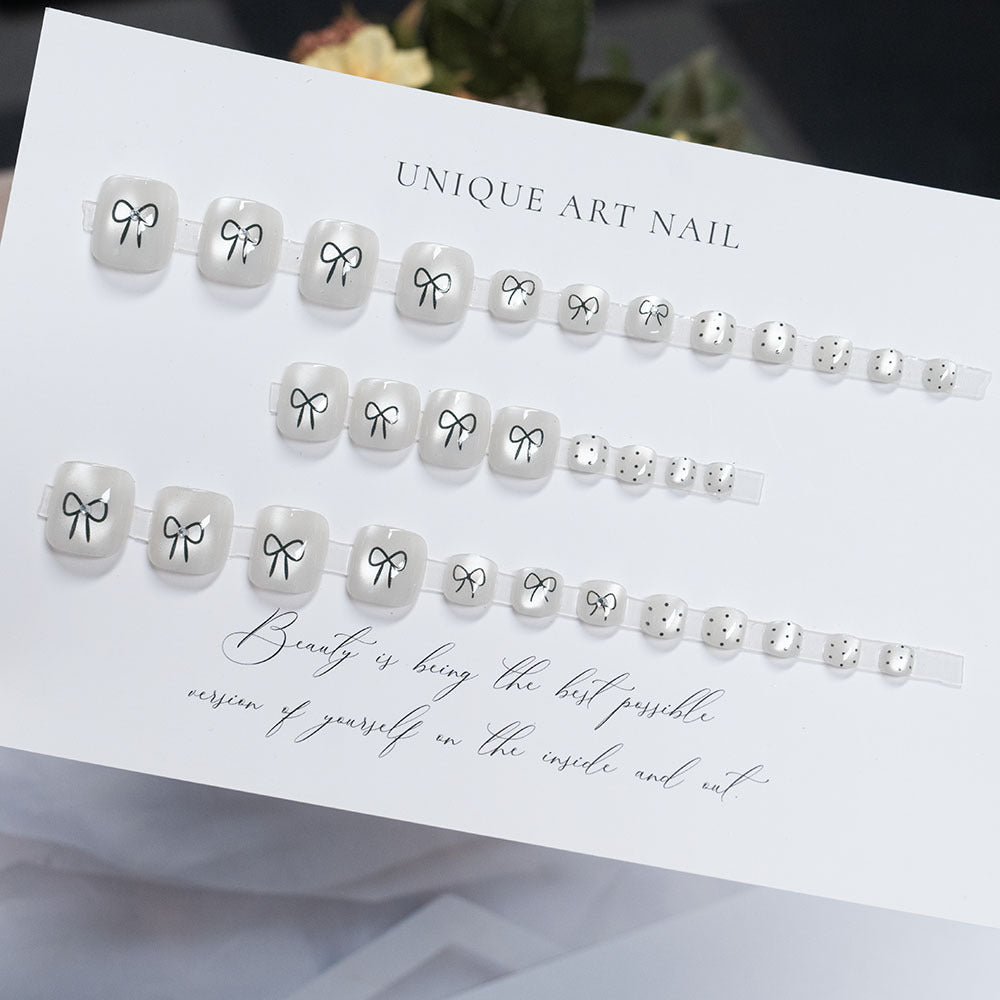 Decorative Bow-Accented Toenail Art