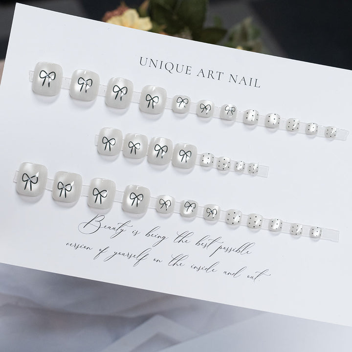 Decorative Bow-Accented Toenail Art