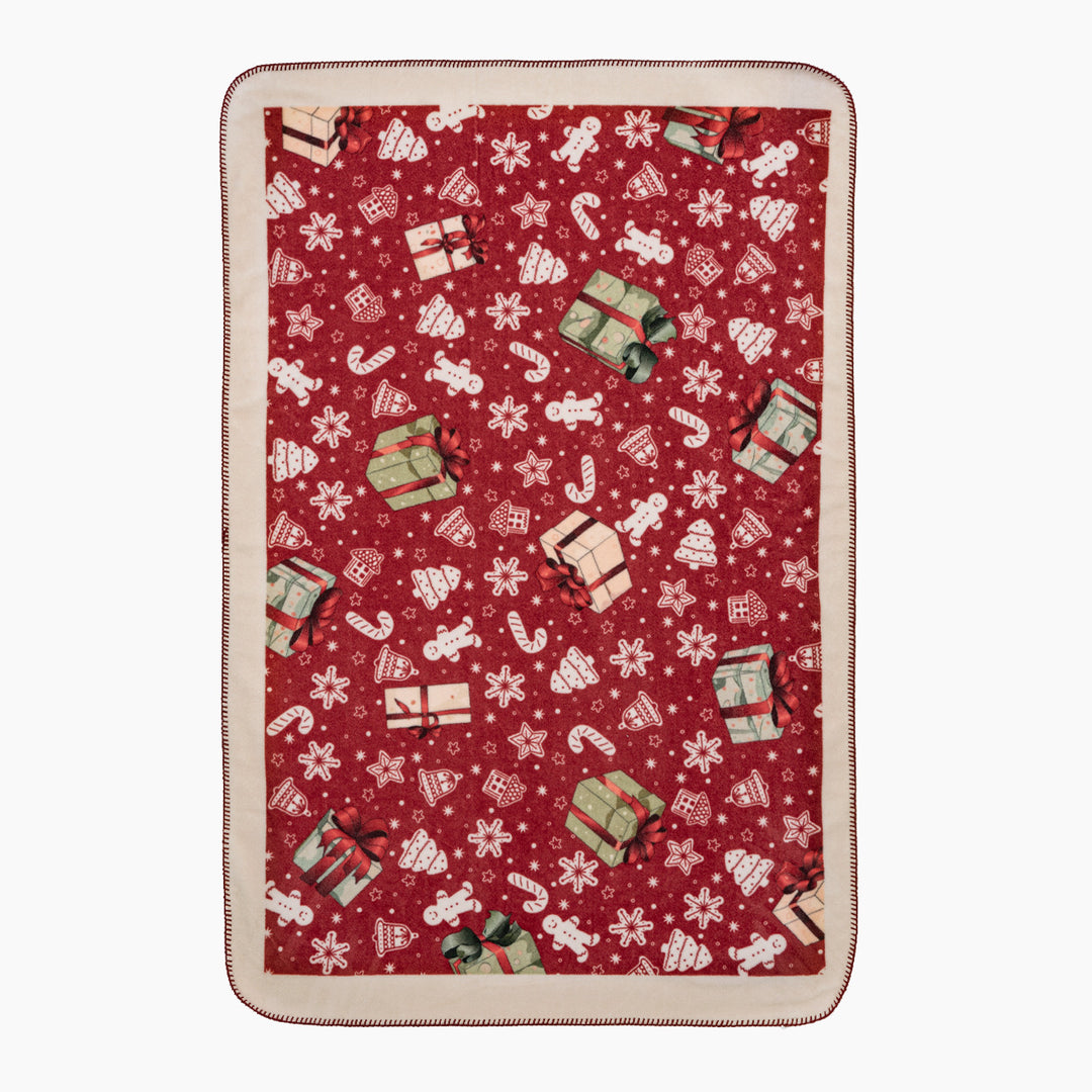 Christmas cuddle blanket with gift and gingerbread pattern