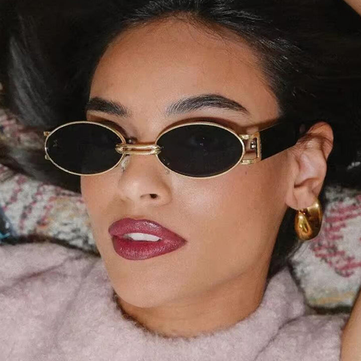 Women oval-shaped sunglasses with golden accents and stylish frame Kalsten
