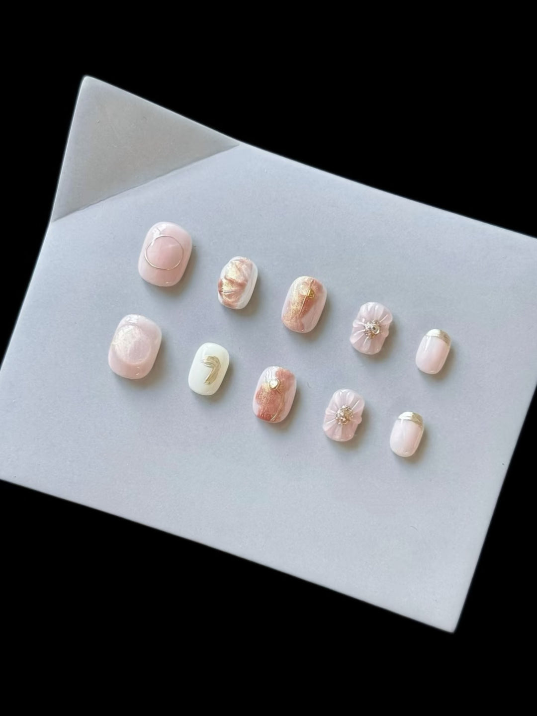 Artistic Press-On Nail Set with Decorative Floral Accents