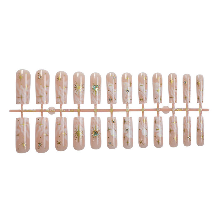 Nail set with glamorous gold decorations Kalsten