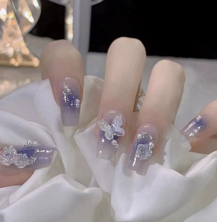 Elegant nail design with pearl embellishment Kalsten