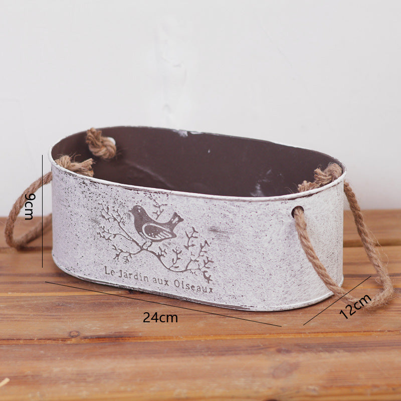 Decorative storage basket made of metal with natural design Kalsten