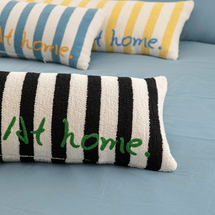 Long lumbar support cushion with ergonomic filling and striped chenille texture