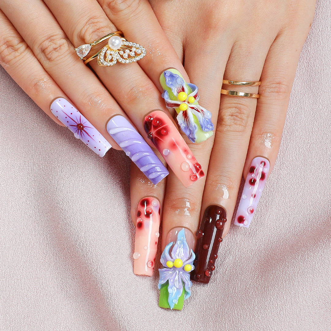 Creative artificial nail set with elegant floral design and glitter accents Kalsten