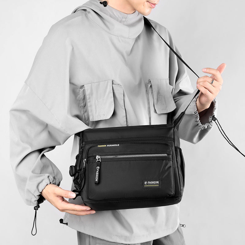 Multi-Compartment Travel Messenger Bag