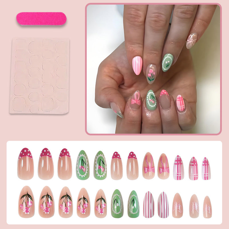Acrylic nail set with floral and playful designs Kalsten