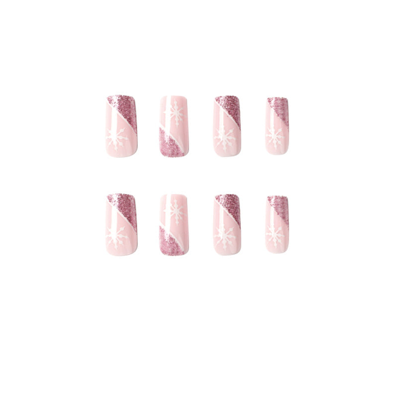 Artful Nail Extensions with Festive Glitter and Snowflake Design Kalsten