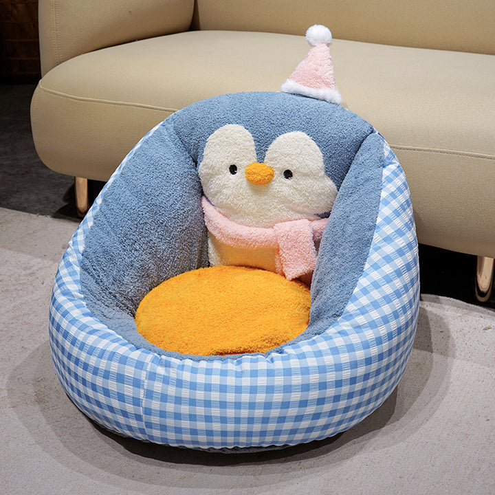 Cozy pet bed with plush penguin back support and ergonomic cuddle pillow