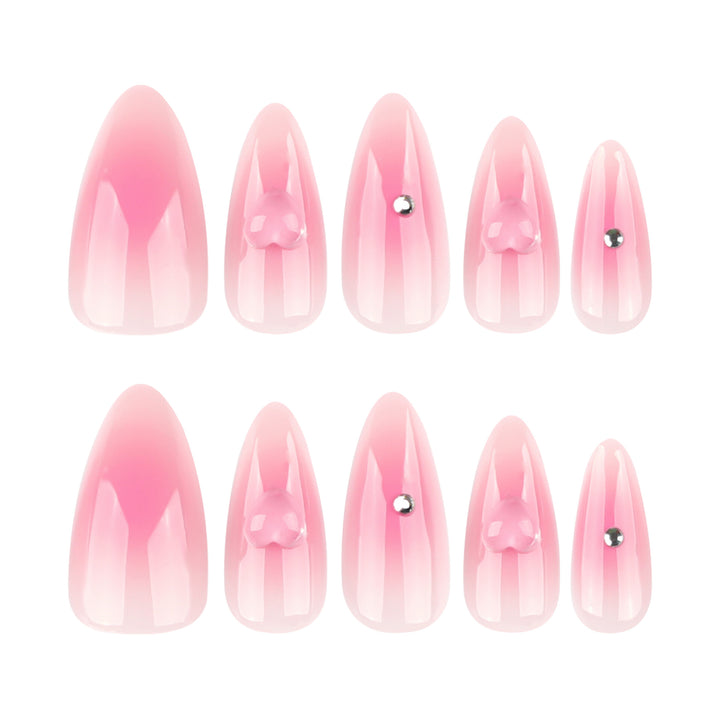 Artful stiletto nails with heart design and glitter accents Kalsten