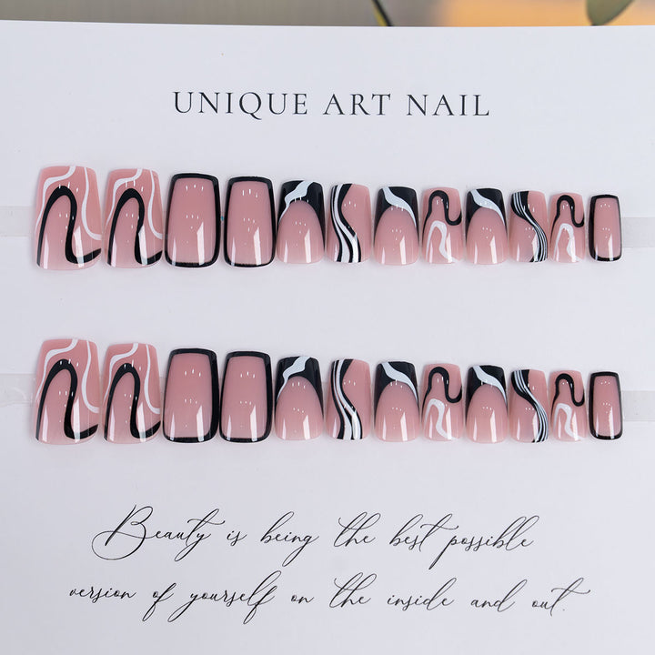 Artistic Long Press-On Nails with Unique Swirl Design