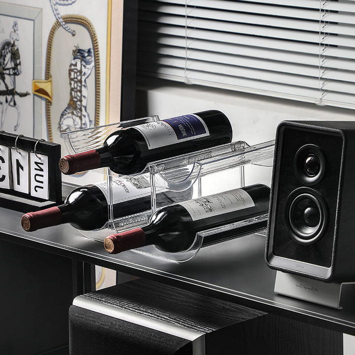 Stackable acrylic wine bottle holder with curved cavities for nine standard bottles